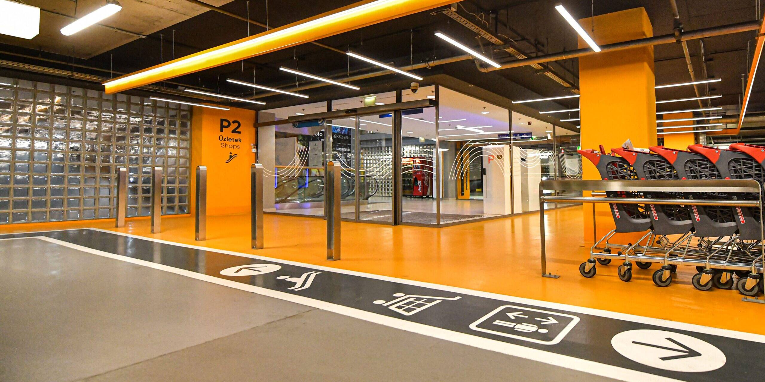 Interior wayfinding signage with timber accents &mdash; Allee Mall, Budapest Hungary, Air Design