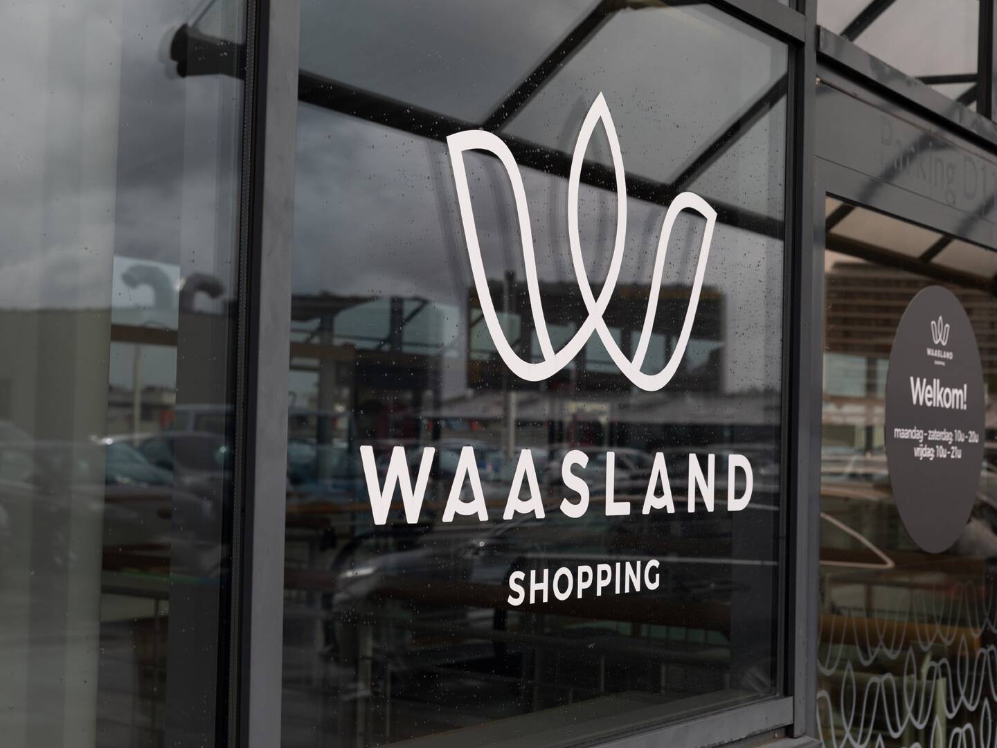 Interior branding and wayfinding redesign driving 20% footfall increase — Waasland Shopping Centre, Sint-Niklaas Belgium, Air Design